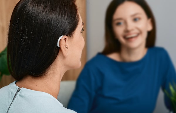 Woman wearing a hearing aid